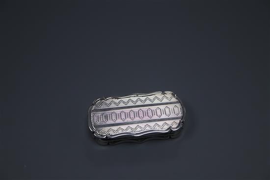 A Victorian engraved rounded rectangular silver vinaigrette, Robert Thornton, Birmingham, 1870, 50mm.